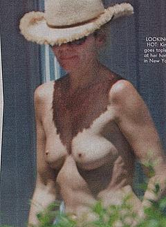 Kim Cattrall caught topless