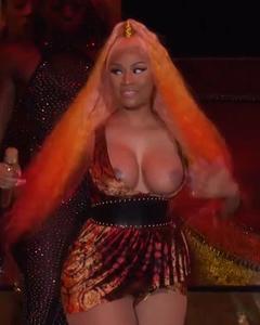 Nicki Minaj boob slip on a stage paparazzi photo