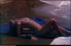 Elina Kantza nude in a fishnet