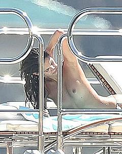 Sara Sampaio sunbathing topless on a yacht in St. Tropez