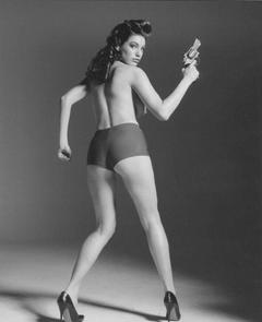 Kelly Brook topless with gun