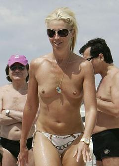 Blonde Tamara Beckwith small nude tits on a beach