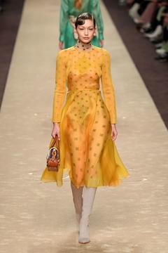 Gigi Hadid in yellow dress at Fendi fashion show in Milan