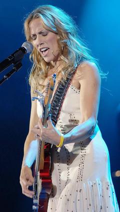 Sheryl Crow performs on a stage