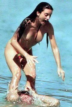Spanish actress and model Penelope Cruz topless in a water paparazzi photo
