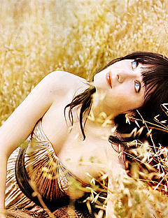Zooey Deschanel posing in nature