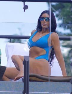 Kim Kardashian in blue monokini