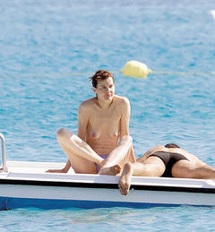 Geena Davis topless on a boat paparazzi photo