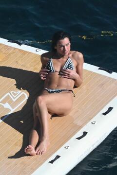 Dua Lipa spends a playful bikini swim day in the waters of Amalfi - June 2025