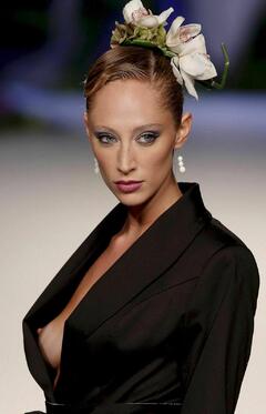 Talytha Pugliesi tit slip runway photo
