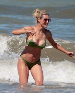 Michelle Hunziker in a green bikini in Milano Marittima