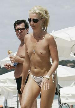 Blonde Tamara Beckwith small nude tits on a beach