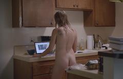 Betsy Holt naked in a kitchen at Animals