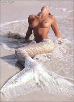 Stephanie Seymour as topless mermaid