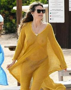 Heidi Klum see through to tits in Sardinia