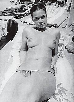 Valerie Kaprisky sunbathing topless