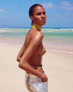 Cindy Bruna topless on a beach