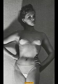 Nadja Tiller wearing see-through panties and topless with body painting by Turhan Bey