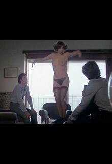 Italian actress Annarita Grapputo topless at Come cani arrabbiati (1976)