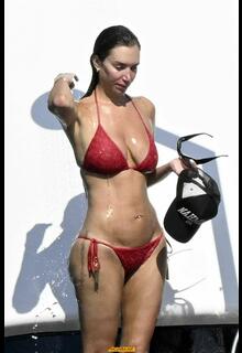 Busty Anastasia Karanikolaou in red bikini on a yacht in Sardinia - August 13, 2026