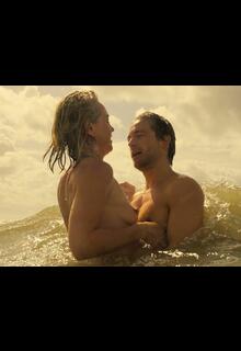 Loes Haverkort topless in the ocean at De Eetclub