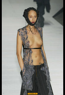 Talytha Pugliesi walks runway topless