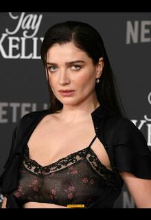 Eve Hewson in see through bra at Jay Kelly premiere