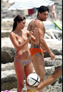 Belen Rodriguez topless candids at the beach in Formentera
