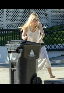Dakota Fanning braless gets her trash can in Los Angeles - October 2025
