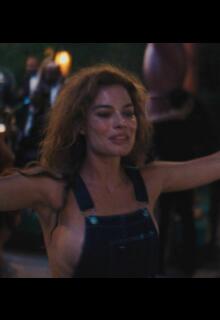 Margot Robbie sideboob at Babylon