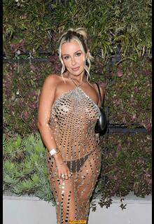 Tana Mongeau braless in sheer dress attends Grammy after party in Los Angeles - February 02, 2025