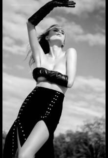 Olga de Mar topless but covered black-&-white image
