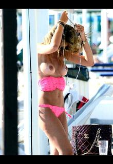 Silvia Abbate topless on a beach paprazzi photo