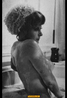 Magali Noel nude in the bathtub black-&-white image