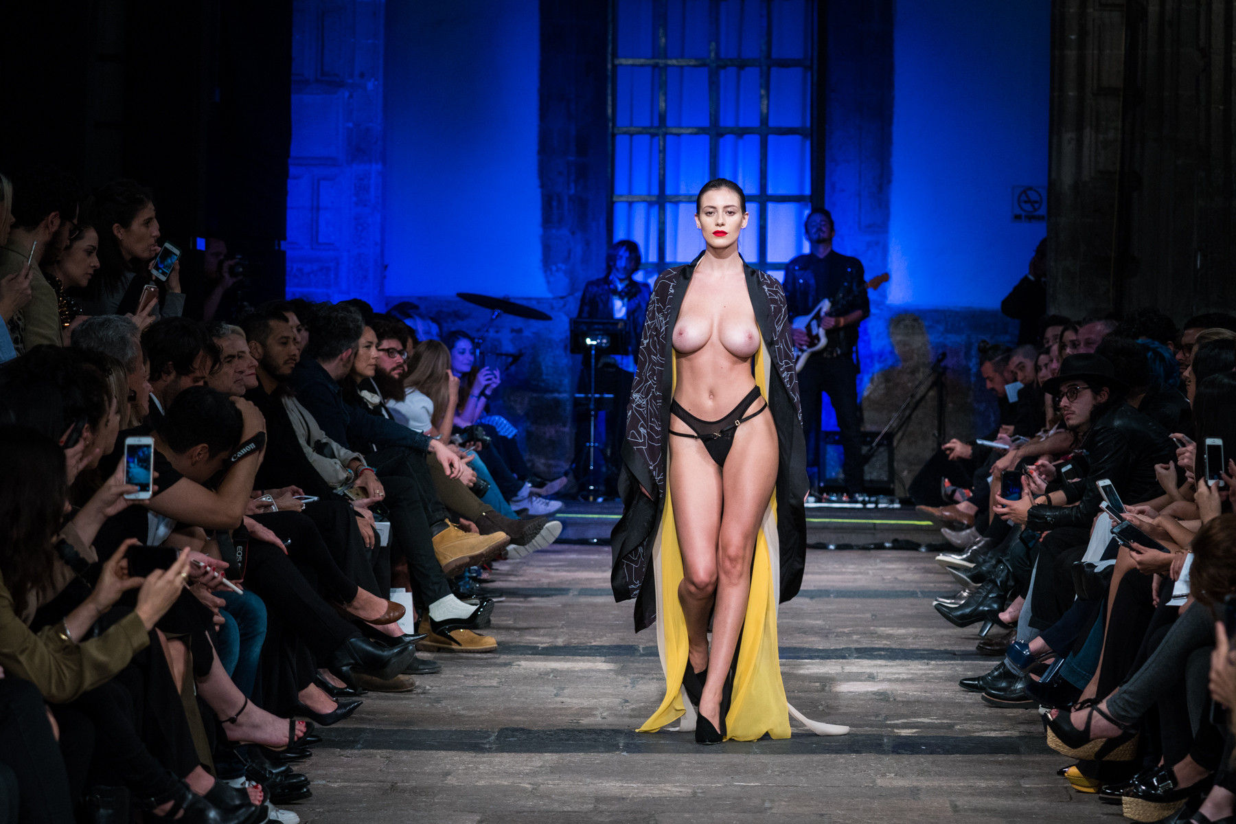 Partially Nude Protesters Storm The Runway