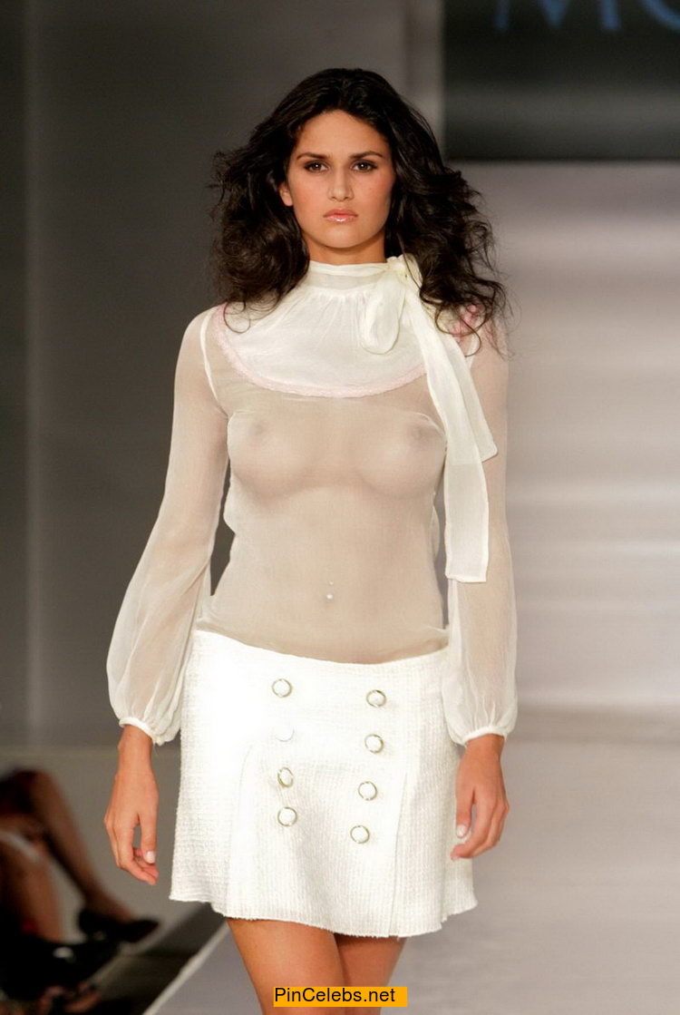 Leryn Franco braless in see through top runway photo. 