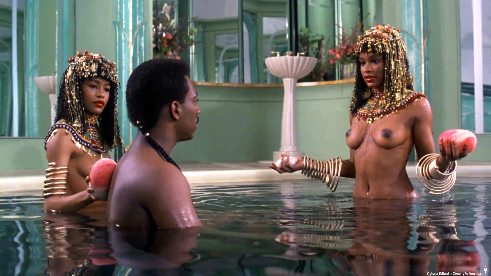 Black actress Victoria Dillard topless in Coming To America. 