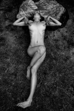 Eliza Sys lying nude by Andrea Gandini