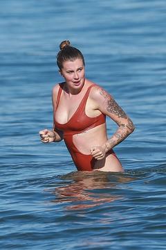 Ireland Baldwin pokies in monokini at the beach in Malibu