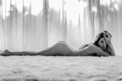Doutzen Kroes lying naked black-&-white image
