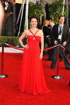 Carla Gugino in red dress at red carpet
