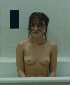 Lily-Rose Depp nude tits in a abthtub at Wolf