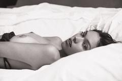 Caterin Valdivieso topless in a bed