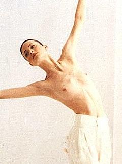 Shalom Harlow topless in white skirt