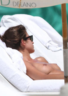 Yaya Kosikova sunbathing topless