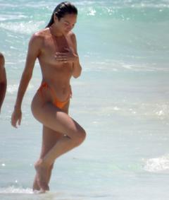 Candice Swanepoel topless at the beach in Tulum