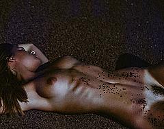 Marisa Papen fully nude on a beach