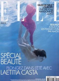 French actress Laetitia Casta nude in a water for Elle magazine
