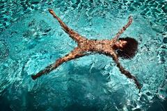 Nereyda Bird nude in a water