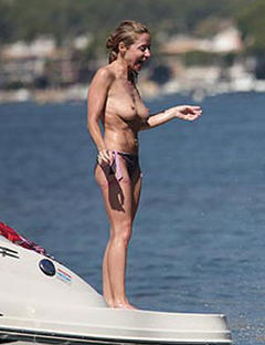 Sarah Honeywell topless on a yacht